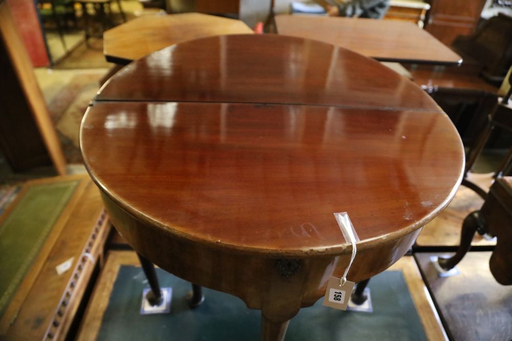 A George II mahogany and fruitwood games table, with hinged top and raised on pole and pad supports, width 75cm, depth 38cm, height 73c